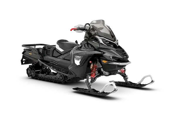 Black and white Lynx Commander snowmobile with rear cargo rack for utility