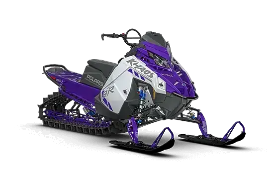 Purple and white Polaris PRO RMK mountain snowmobile with purple tunnel