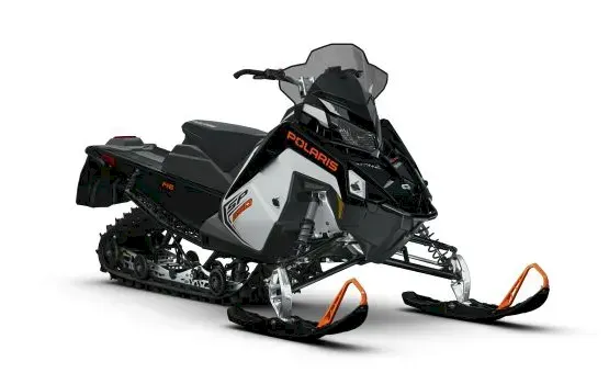 Black and white Polaris SWITCHBACK SP snowmobile with orange skis