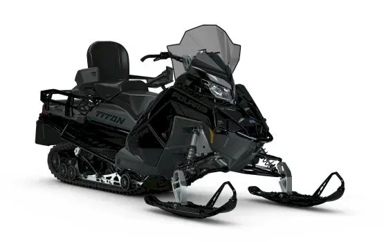 Black Polaris TITAN Adventure snowmobile with passenger seat and cargo box