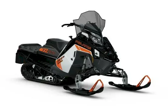 Black and white Polaris TITAN SP snowmobile with orange skis