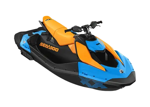 Dark blue and black Sea-Doo Spark Trixx shown performing a wheelie maneuver in the ocean