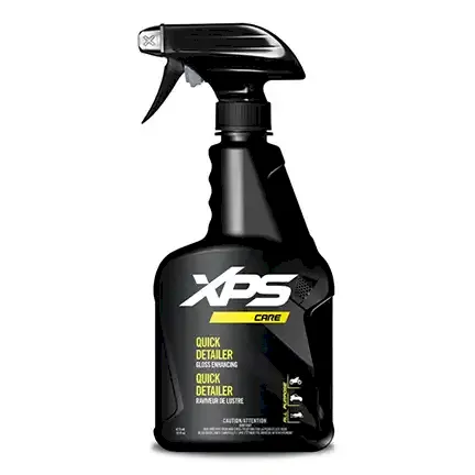 Black spray bottle of XPS Black Plastic & Rubber Restorer on a white background