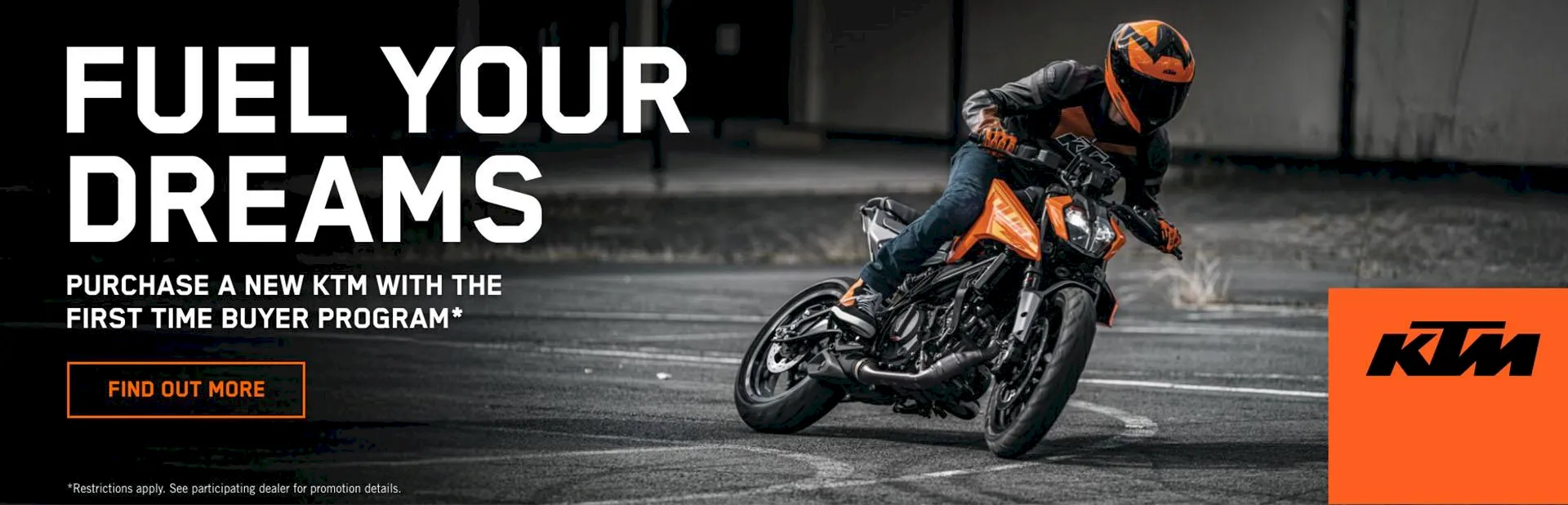 KTM motorcycle rider leaning into a turn with First Time Buyer Program promotion banner